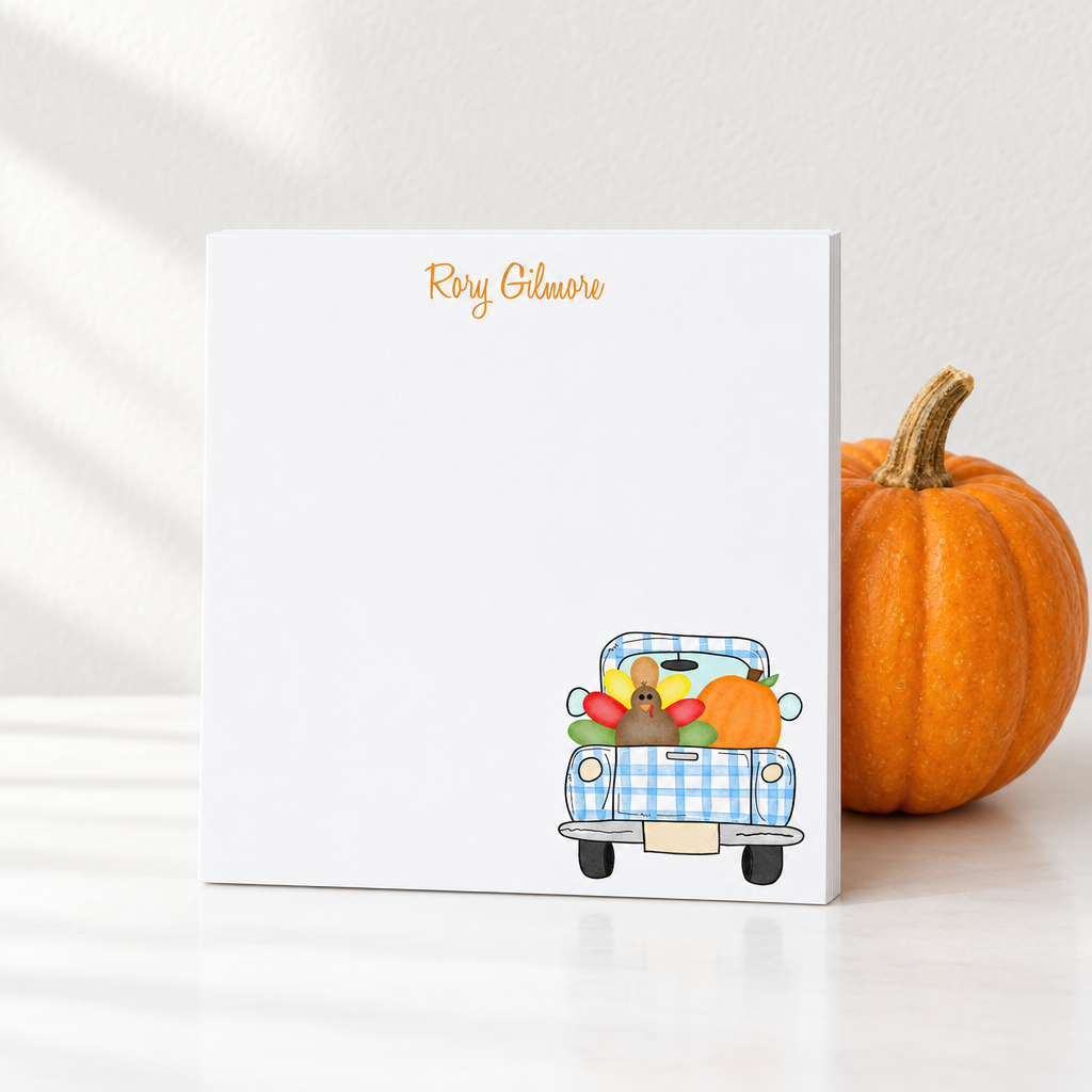 Turkey Truck notepad propped against a real pumpkin